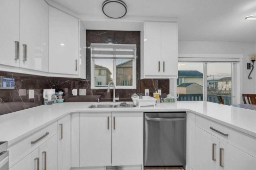 107 Taracove Landing Ne, Calgary, AB - Indoor Photo Showing Kitchen