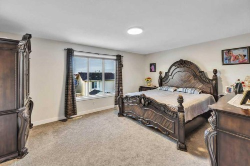 107 Taracove Landing Ne, Calgary, AB - Indoor Photo Showing Bedroom
