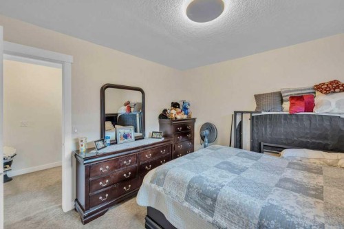 107 Taracove Landing Ne, Calgary, AB - Indoor Photo Showing Bedroom