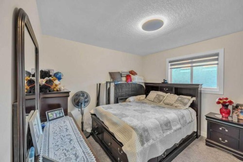 107 Taracove Landing Ne, Calgary, AB - Indoor Photo Showing Bedroom