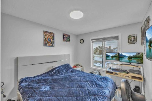 107 Taracove Landing Ne, Calgary, AB - Indoor Photo Showing Bedroom