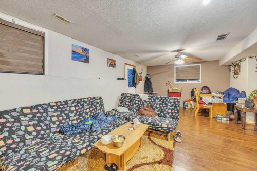 107 Taracove Landing Ne, Calgary, AB - Indoor Photo Showing Living Room