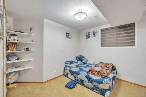 107 Taracove Landing Ne, Calgary, AB - Indoor Photo Showing Bedroom
