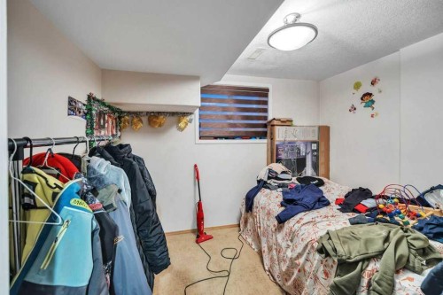 107 Taracove Landing Ne, Calgary, AB - Indoor Photo Showing Bedroom