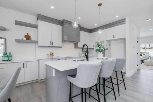 1917 Mccaskill Drive, Crossfield, AB - Indoor Photo Showing Kitchen With Upgraded Kitchen