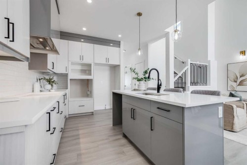 1917 Mccaskill Drive, Crossfield, AB - Indoor Photo Showing Kitchen With Upgraded Kitchen