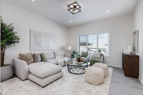 1917 Mccaskill Drive, Crossfield, AB - Indoor Photo Showing Living Room