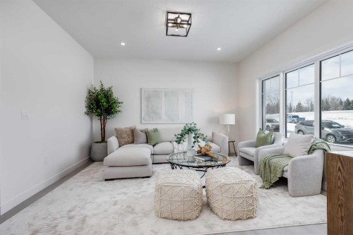 1917 Mccaskill Drive, Crossfield, AB - Indoor Photo Showing Living Room