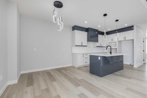 1955 Mccaskill Drive, Crossfield, AB - Indoor Photo Showing Kitchen With Upgraded Kitchen