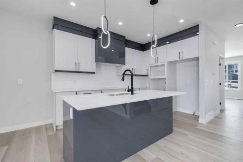 1955 Mccaskill Drive, Crossfield, AB - Indoor Photo Showing Kitchen With Upgraded Kitchen