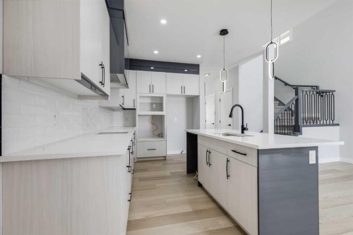 1955 Mccaskill Drive, Crossfield, AB - Indoor Photo Showing Kitchen With Upgraded Kitchen