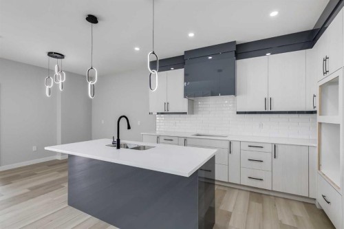 1955 Mccaskill Drive, Crossfield, AB - Indoor Photo Showing Kitchen With Upgraded Kitchen