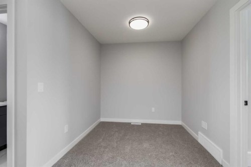 1955 Mccaskill Drive, Crossfield, AB - Indoor Photo Showing Other Room
