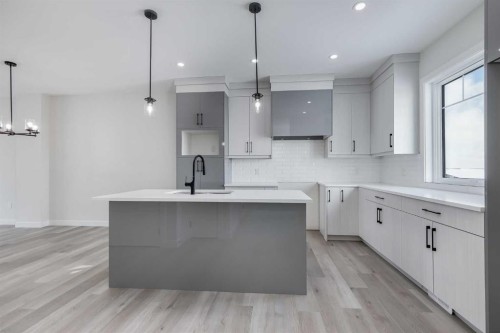 1989 Mccaskill Drive, Crossfield, AB - Indoor Photo Showing Kitchen With Upgraded Kitchen