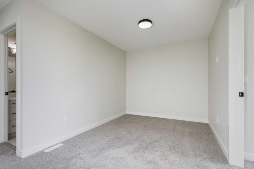 1989 Mccaskill Drive, Crossfield, AB - Indoor Photo Showing Other Room