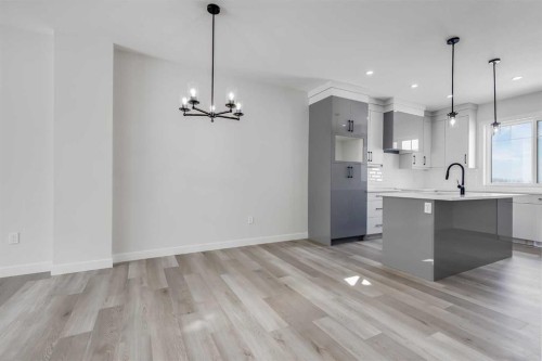 1989 Mccaskill Drive, Crossfield, AB - Indoor Photo Showing Kitchen With Upgraded Kitchen