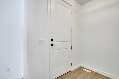 230 Kinniburgh Loop, Chestermere, AB - Indoor Photo Showing Other Room