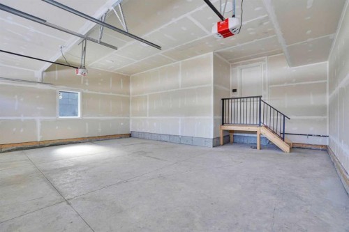 230 Kinniburgh Loop, Chestermere, AB - Indoor Photo Showing Garage