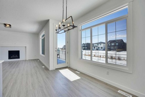 230 Kinniburgh Loop, Chestermere, AB - Indoor With Fireplace