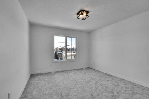 230 Kinniburgh Loop, Chestermere, AB - Indoor Photo Showing Other Room