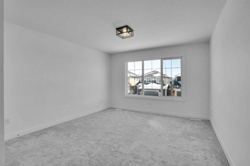 230 Kinniburgh Loop, Chestermere, AB - Indoor Photo Showing Other Room