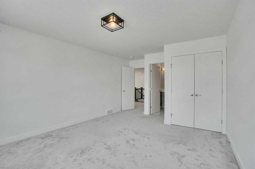 230 Kinniburgh Loop, Chestermere, AB - Indoor Photo Showing Other Room