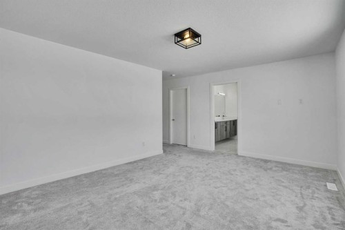 230 Kinniburgh Loop, Chestermere, AB - Indoor Photo Showing Other Room