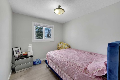 990 Marcombe Drive Ne, Calgary, AB - Indoor Photo Showing Bedroom