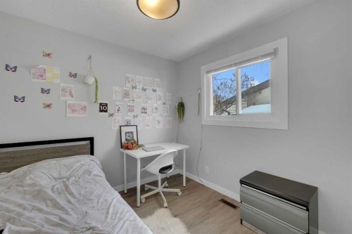 990 Marcombe Drive Ne, Calgary, AB - Indoor Photo Showing Bedroom