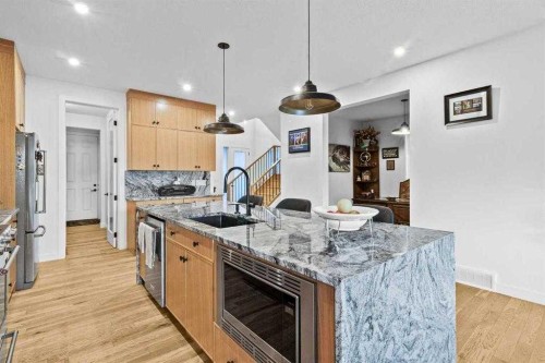 44 Ranchers Way, Okotoks, AB - Indoor Photo Showing Kitchen With Upgraded Kitchen