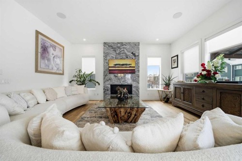 44 Ranchers Way, Okotoks, AB - Indoor Photo Showing Living Room With Fireplace