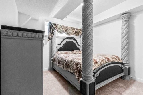 44 Ranchers Way, Okotoks, AB - Indoor Photo Showing Bedroom