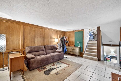 319 Whitney Crescent Se, Calgary, AB - Indoor Photo Showing Living Room