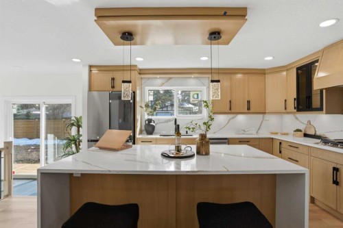 1303 87 Avenue Sw, Calgary, AB - Indoor Photo Showing Kitchen With Double Sink With Upgraded Kitchen
