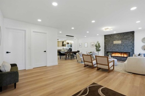 1303 87 Avenue Sw, Calgary, AB - Indoor Photo Showing Living Room With Fireplace