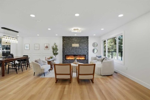 1303 87 Avenue Sw, Calgary, AB - Indoor Photo Showing Living Room With Fireplace
