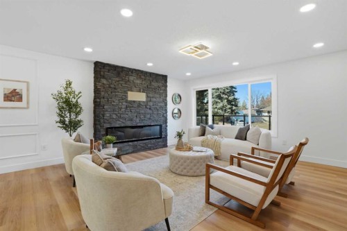 1303 87 Avenue Sw, Calgary, AB - Indoor Photo Showing Living Room With Fireplace