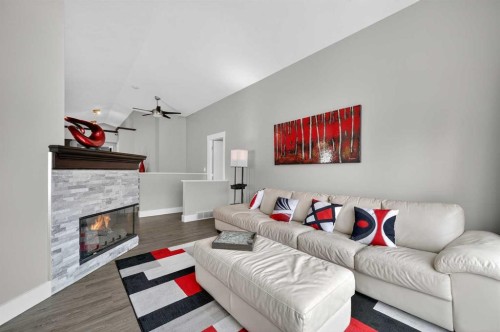 140 Citadel Park Nw, Calgary, AB - Indoor Photo Showing Living Room With Fireplace
