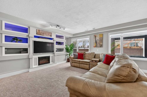 140 Citadel Park Nw, Calgary, AB - Indoor Photo Showing Living Room With Fireplace