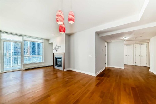 1126-222 Riverfront Avenue Sw, Calgary, AB - Indoor With Fireplace
