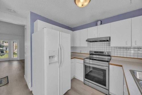 67 Martinwood Road Ne, Calgary, AB - Indoor Photo Showing Kitchen