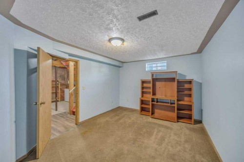 67 Martinwood Road Ne, Calgary, AB - Indoor Photo Showing Other Room