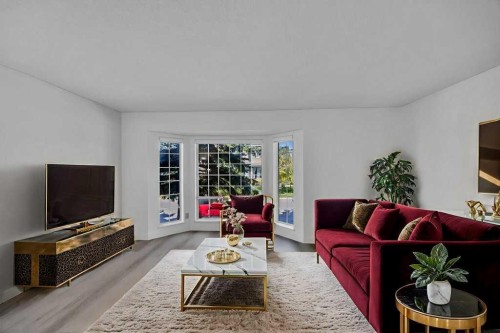 67 Martinwood Road Ne, Calgary, AB - Indoor Photo Showing Living Room