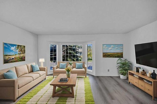 67 Martinwood Road Ne, Calgary, AB - Indoor Photo Showing Living Room