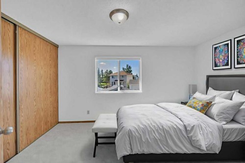 67 Martinwood Road Ne, Calgary, AB - Indoor Photo Showing Bedroom