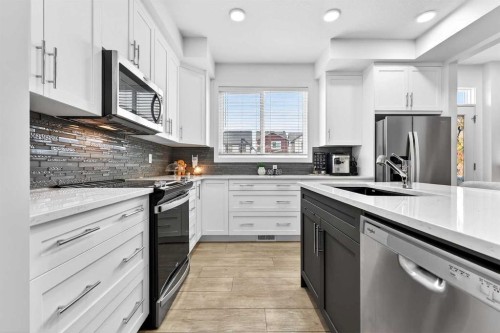 42 Heirloom Manor Se, Calgary, AB - Indoor Photo Showing Kitchen With Stainless Steel Kitchen With Upgraded Kitchen