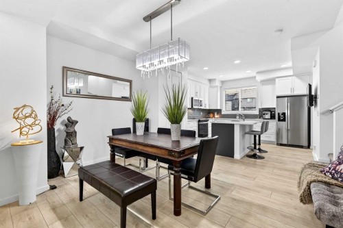 42 Heirloom Manor Se, Calgary, AB - Indoor Photo Showing Dining Room