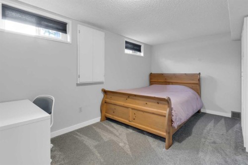 356 Cannington Place Sw, Calgary, AB - Indoor Photo Showing Bedroom