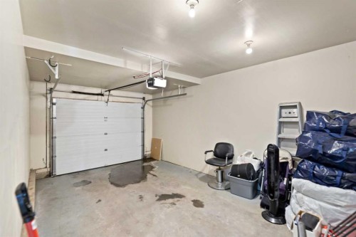 173 Bayside Point Sw, Airdrie, AB - Indoor Photo Showing Garage