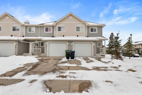 173 Bayside Point Sw, Airdrie, AB - Outdoor With Facade